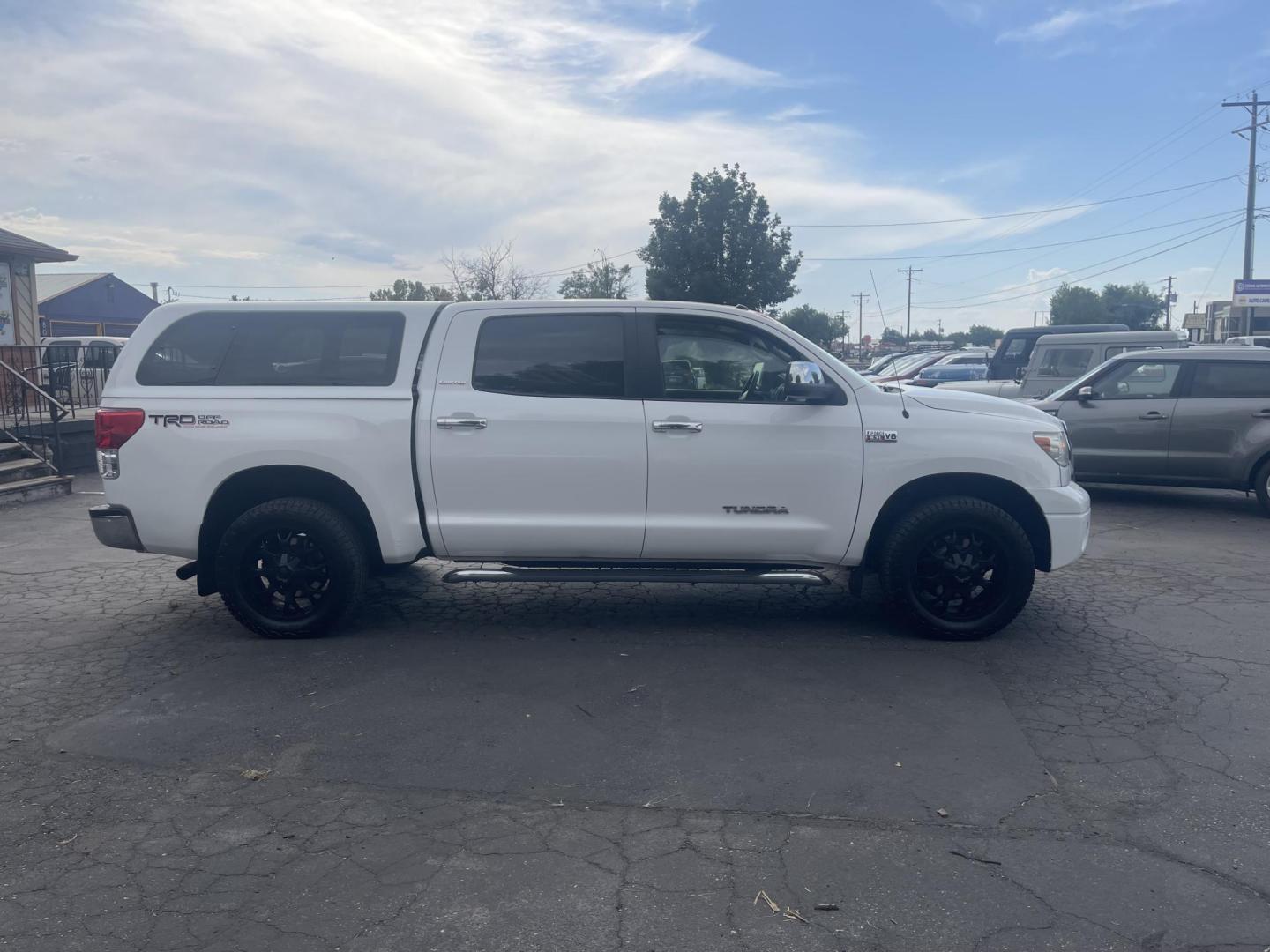 2013 Super White /Grey Toyota Tundra 4WD Truck Limited (5TFHW5F18DX) with an V8, 5.7L; FFV engine, AT transmission, located at 813 E Fairview Ave, Meridian , ID, 83642, (208) 336-8230, 43.618851, -116.384010 - New tires, NAV, Custom Wheels, Leather, Limited Package, Crew Maxx not a double cab, and Sunroof. Save yourself thousands of dollars because of the mileage. Very nice condition well cared for. - Photo#3