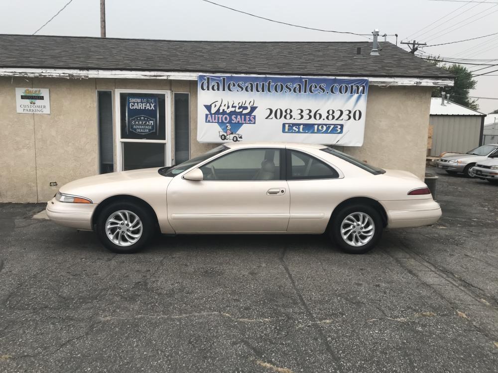 1995 /Tan Lincoln Mark VIII Base (1LNLM91V0SY) with an 4.6L V8 DOHC 32V engine, 4-Speed Automatic Overdrive transmission, located at 813 E Fairview Ave, Meridian , ID, 83642, (208) 336-8230, 43.618851, -116.384010 - Look at this a 1 owner always stored inside mid 90s Luxury car with only 86k actual miles on it. Luxury for cheap come see for yourself. - Photo #0