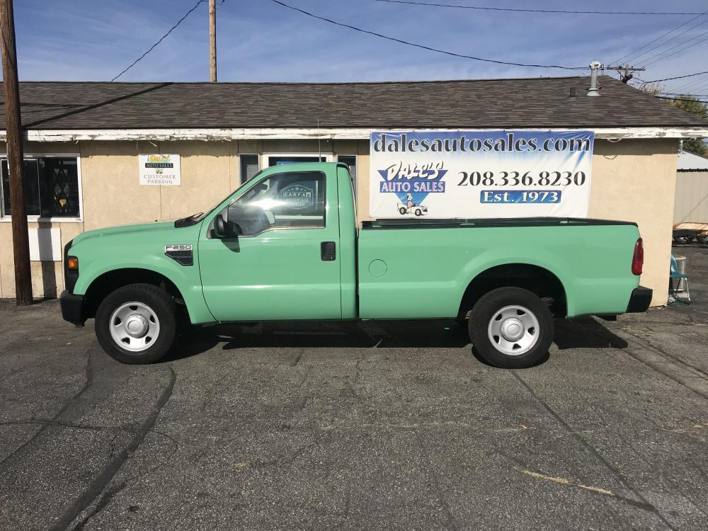 2008 Green /Grey Ford F-250 SD XL 2WD (1FTNF20Y88E) with an 6.8L V10 SOHC 30V engine, Manual transmission, located at 813 E Fairview Ave, Meridian , ID, 83642, (208) 336-8230, 43.618851, -116.384010 - Check this pickup out!!! A Super Duty 3/4 ton with only 51k miles and a manual transmission. There is not many of these types of pickups around. If you want an excellent tow vehicle this is your pickup. It is super clean and very straight a definite must see. - Photo #0