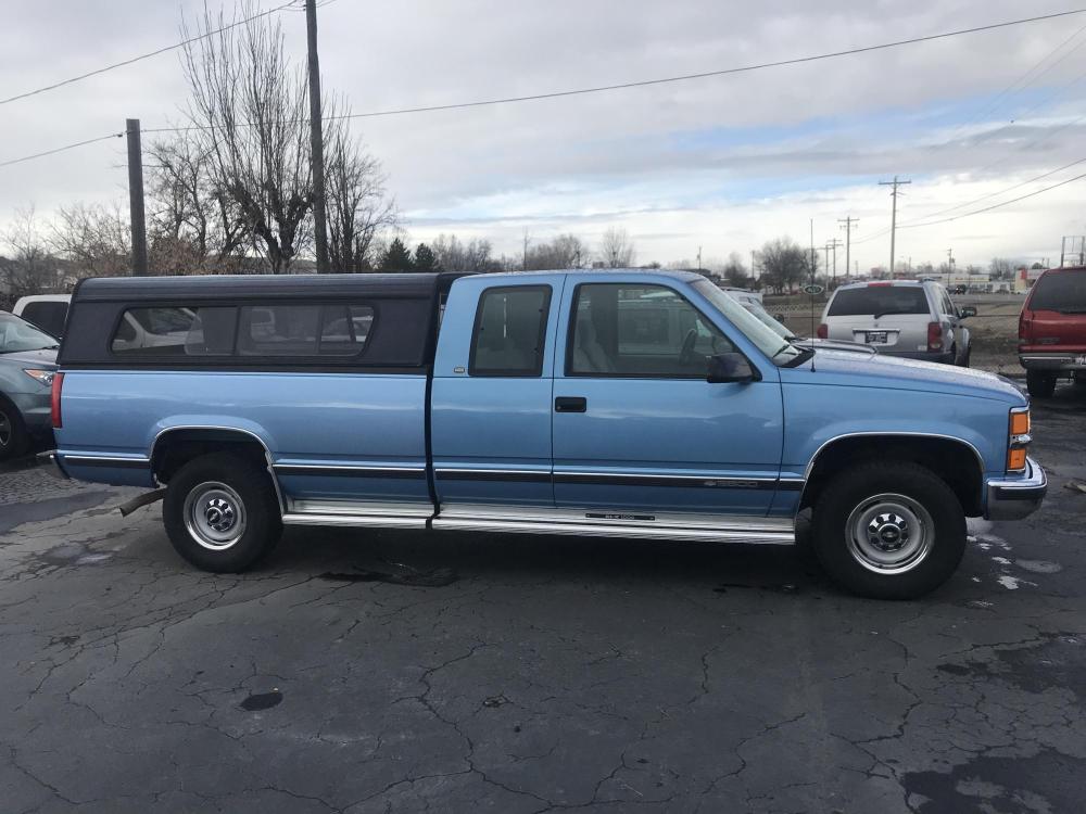 1997 Blue /Grey Chevrolet C/K 2500 Silverado (1GCGC29J0VE) with an 7.4L V8 OHV 16V engine, Automatic transmission, located at 813 E Fairview Ave, Meridian , ID, 83642, (208) 336-8230, 43.618851, -116.384010 - An impeccable example of a pickup. Only 2 owners exceptionally clean and well cared for and low low miles. This pickup has the 454 and 4.10 gears it is built to tow and do a great job. The pickup only has 80k miles and comes with power seat, power windows, and power locks with A/C, tilt and crui - Photo #0