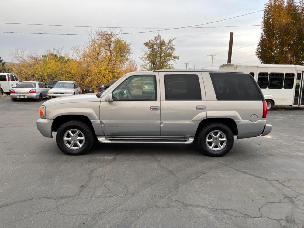 2000 Silver /Grey GMC Yukon Denali Denali 4WD (1GKEK13R5YR) with an 5.7L V8 OHV 16V engine, 4-Speed Automatic Overdrive transmission, located at 813 E Fairview Ave, Meridian , ID, 83642, (208) 336-8230, 43.618851, -116.384010 - Take a look at this!!! A one owner in Boise, super clean, meticulously maintained, the Carfax is perfect all the maintenance shows up. If you need a great vehicle for not a lot of money this is a great option. You will not find a nicer older SUV. - Photo #0
