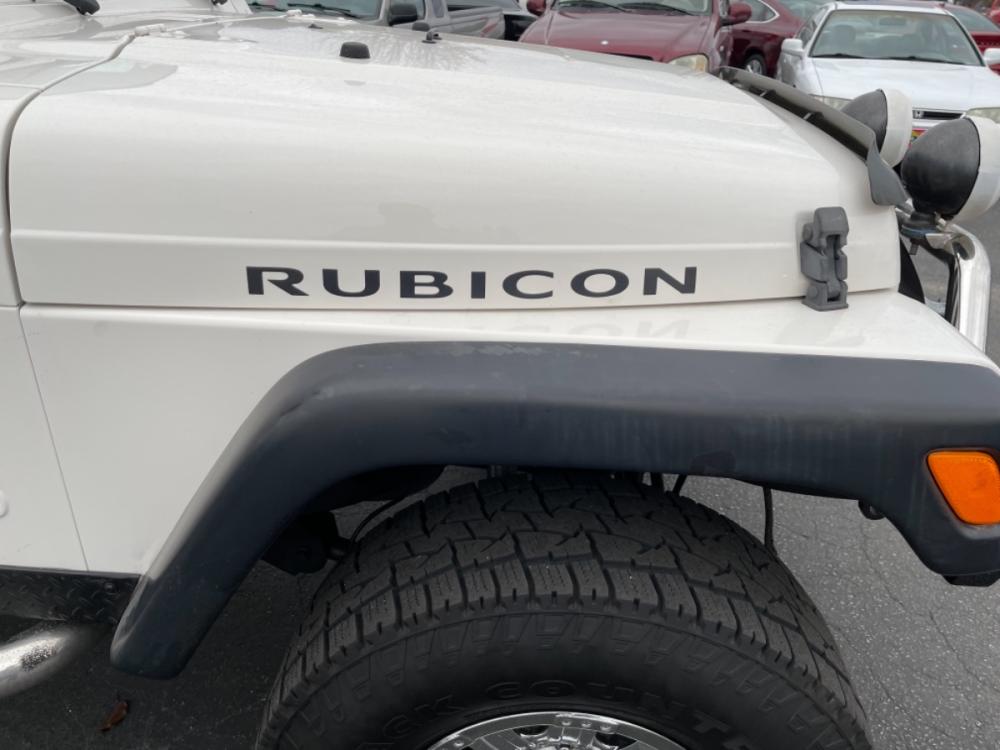 2006 Alpine White /Black Jeep Wrangler Rubicon (1J4FA69SX6P) with an 4.0L L6 OHV 12V engine, AT transmission, located at 813 E Fairview Ave, Meridian , ID, 83642, (208) 336-8230, 43.618851, -116.384010 - Check it out!!! A super low mileage Wrangler with the Infamous Rubicon Package. It has the Hard Top, A/C, Cruise, and tilt. These are sooooo fun a definite must see if you like Wranglers. - Photo #1