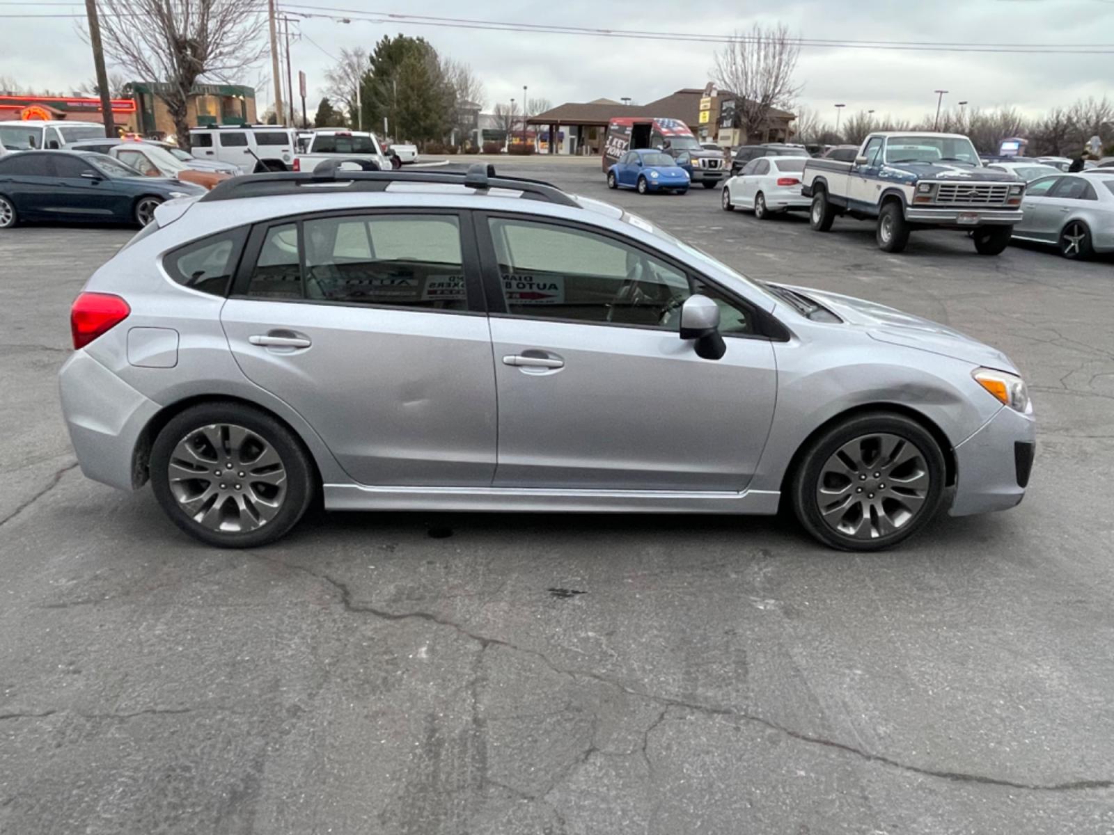 2014 Silver /Black Subaru Impreza 2.0i Sport Limited (JF1GPAU67E8) with an 2.0L H4 DOHC 16V engine, Continuously Variable Transmission transmission, located at 813 E Fairview Ave, Meridian , ID, 83642, (208) 336-8230, 43.618851, -116.384010 - Photo #4