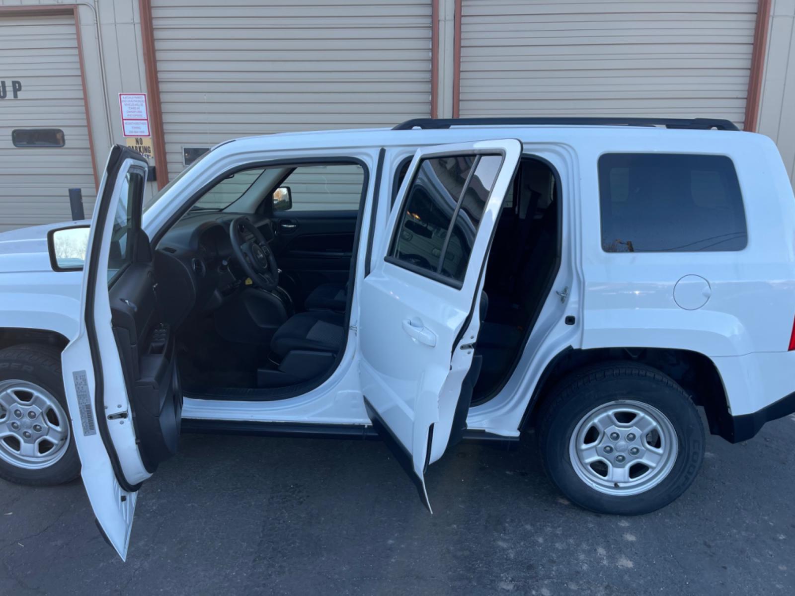2017 Alpine White /Black Jeep Patriot Sport 4WD (1C4NJRBB3HD) with an 2.4L L4 DOHC 16V engine, AT transmission, located at 813 E Fairview Ave, Meridian , ID, 83642, (208) 336-8230, 43.618851, -116.384010 - Photo #9