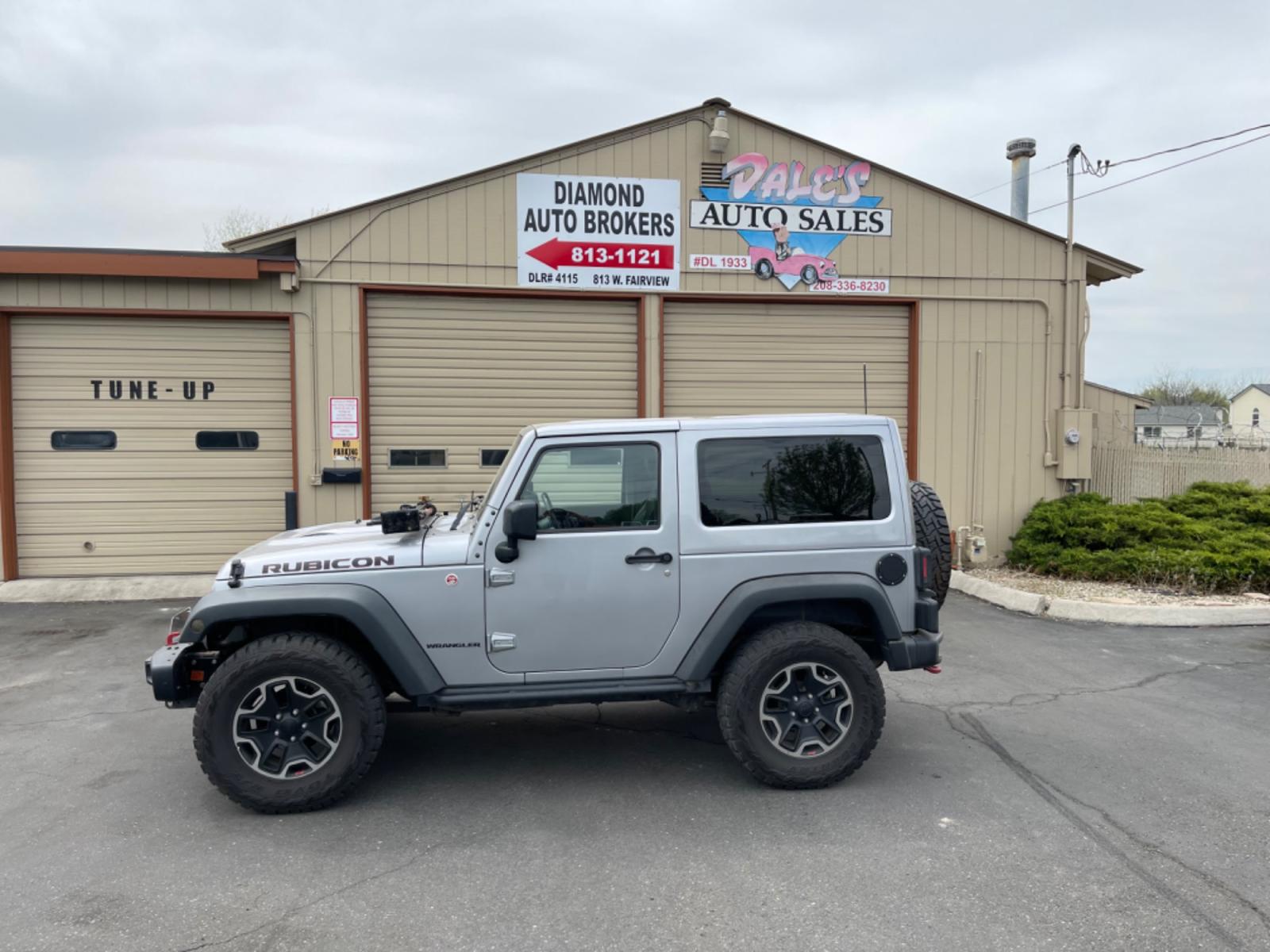 2015 Silver /Black Jeep Wrangler Rubicon 4WD (1C4BJWCG7FL) with an 3.6L V6 DOHC 24V FFV engine, 6-Speed Manual transmission, located at 813 E Fairview Ave, Meridian , ID, 83642, (208) 336-8230, 43.618851, -116.384010 - Photo #0