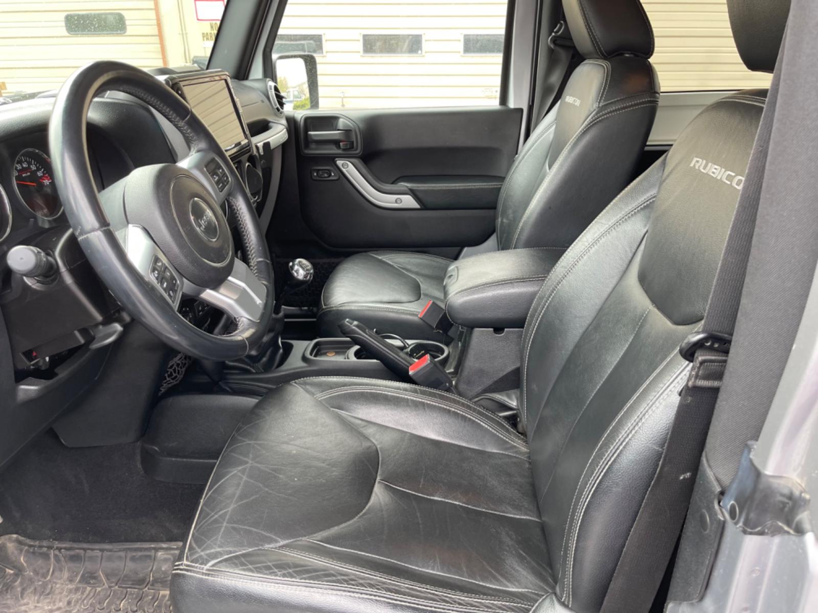 2015 Silver /Black Jeep Wrangler Rubicon 4WD (1C4BJWCG7FL) with an 3.6L V6 DOHC 24V FFV engine, 6-Speed Manual transmission, located at 813 E Fairview Ave, Meridian , ID, 83642, (208) 336-8230, 43.618851, -116.384010 - Photo #6