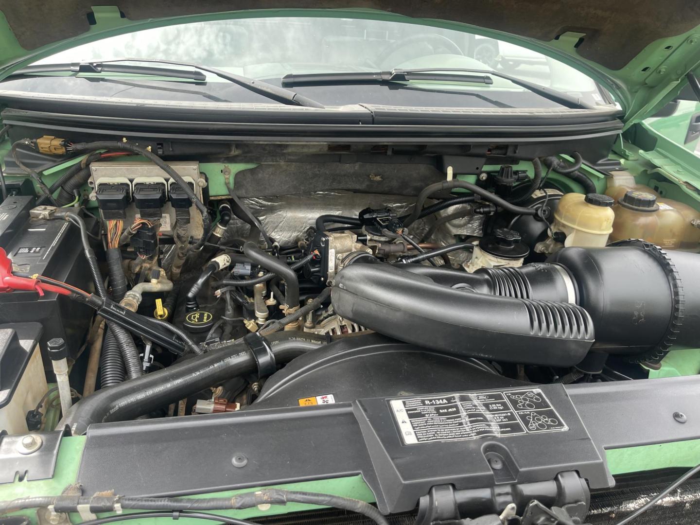 2008 Forest Service Green /Tan Ford F-150 STX 4WD (1FTRF14W38K) with an 4.6L V8 SOHC 16V engine, 4-Speed Automatic Overdrive transmission, located at 813 E Fairview Ave, Meridian , ID, 83642, (208) 336-8230, 43.618851, -116.384010 - Photo#17