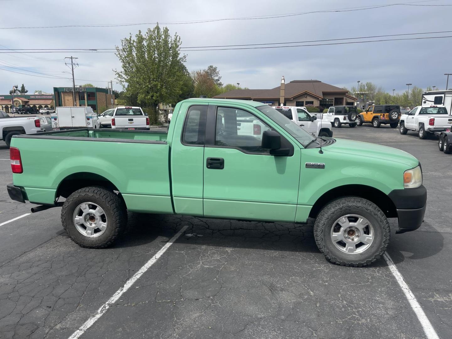 2008 Forest Service Green /Tan Ford F-150 STX 4WD (1FTRF14W38K) with an 4.6L V8 SOHC 16V engine, 4-Speed Automatic Overdrive transmission, located at 813 E Fairview Ave, Meridian , ID, 83642, (208) 336-8230, 43.618851, -116.384010 - Photo#7