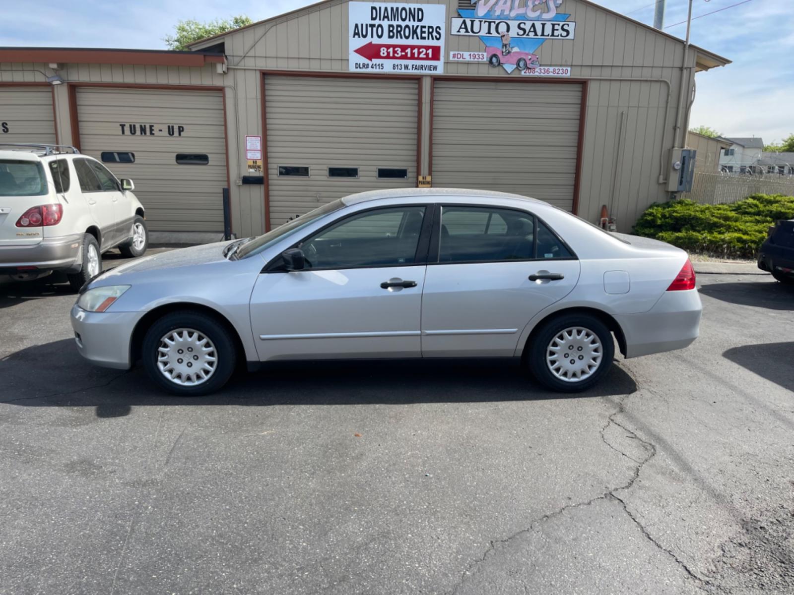 2006 Silver /Black Honda Accord VP Sedan (1HGCM56176A) with an 2.4L L4 DOHC 16V engine, 5-Speed Automatic Overdrive transmission, located at 813 E Fairview Ave, Meridian , ID, 83642, (208) 336-8230, 43.618851, -116.384010 - Photo #0