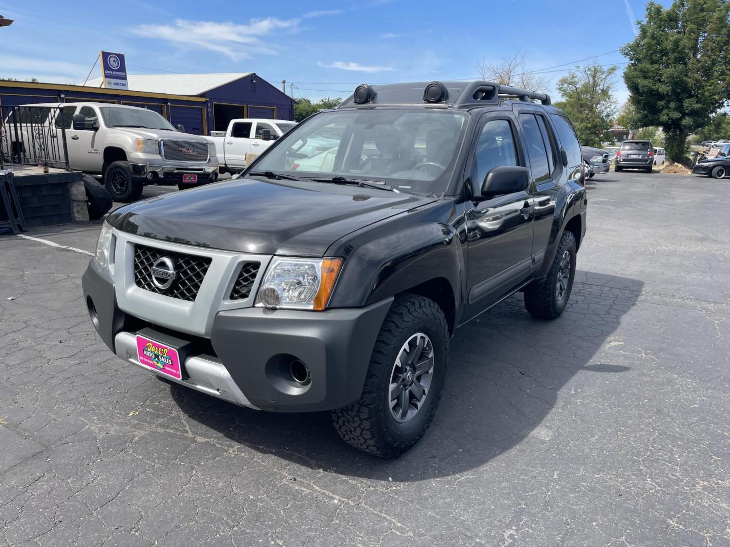 2015 Black /Grey Nissan Xterra PRO-4X (5N1AN0NW9FN) with an 4.0L V6 DOHC 24V engine, 5-Speed Automatic transmission, located at 813 E Fairview Ave, Meridian , ID, 83642, (208) 336-8230, 43.618851, -116.384010 - Photo#1