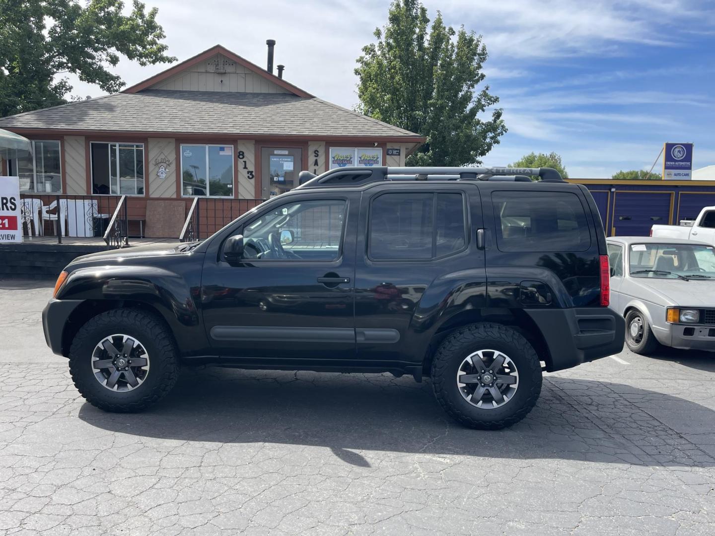 2015 Black /Grey Nissan Xterra PRO-4X (5N1AN0NW9FN) with an 4.0L V6 DOHC 24V engine, 5-Speed Automatic transmission, located at 813 E Fairview Ave, Meridian , ID, 83642, (208) 336-8230, 43.618851, -116.384010 - Photo#0