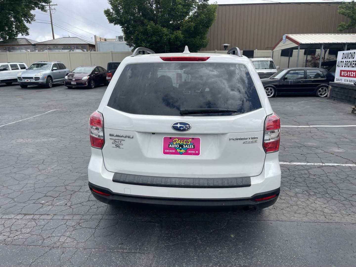 2016 White /Grey Subaru Forester 2.5i Premium (JF2SJADC1GH) with an 2.5L H4 SOHC 16V engine, CVT transmission, located at 813 E Fairview Ave, Meridian , ID, 83642, (208) 336-8230, 43.618851, -116.384010 - Photo#4
