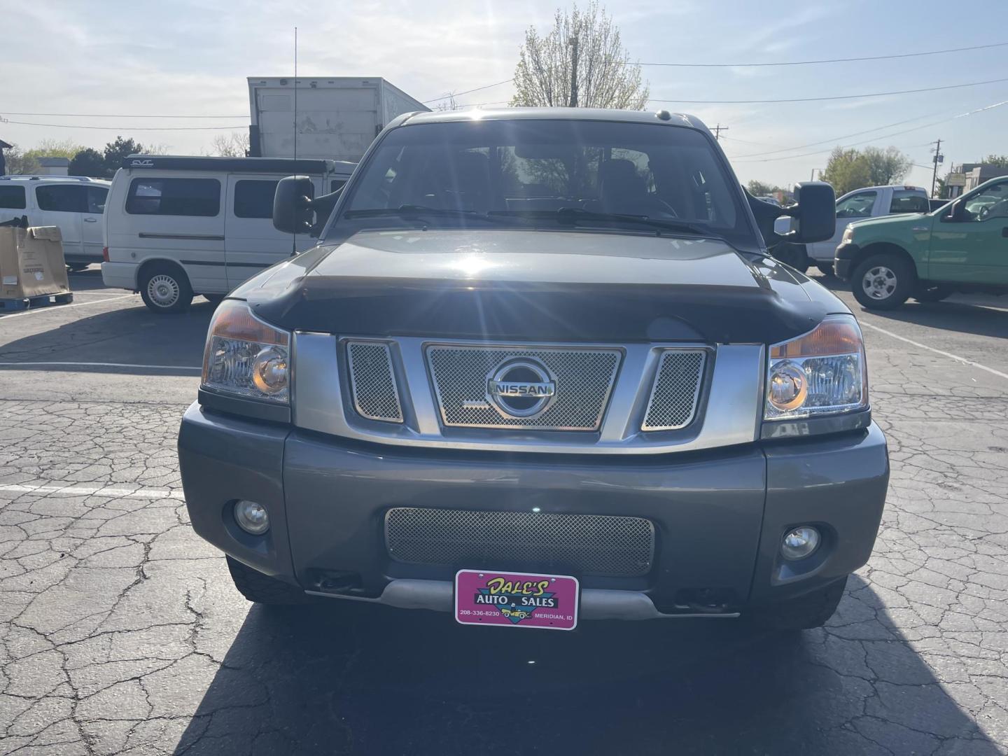 2013 Grey /Black Nissan Titan PRO-4X Crew Cab 4WD SWB (1N6AA0EC9DN) with an 5.6L V8 DOHC 32V engine, 5-Speed Automatic transmission, located at 813 E Fairview Ave, Meridian , ID, 83642, (208) 336-8230, 43.618851, -116.384010 - Photo#2