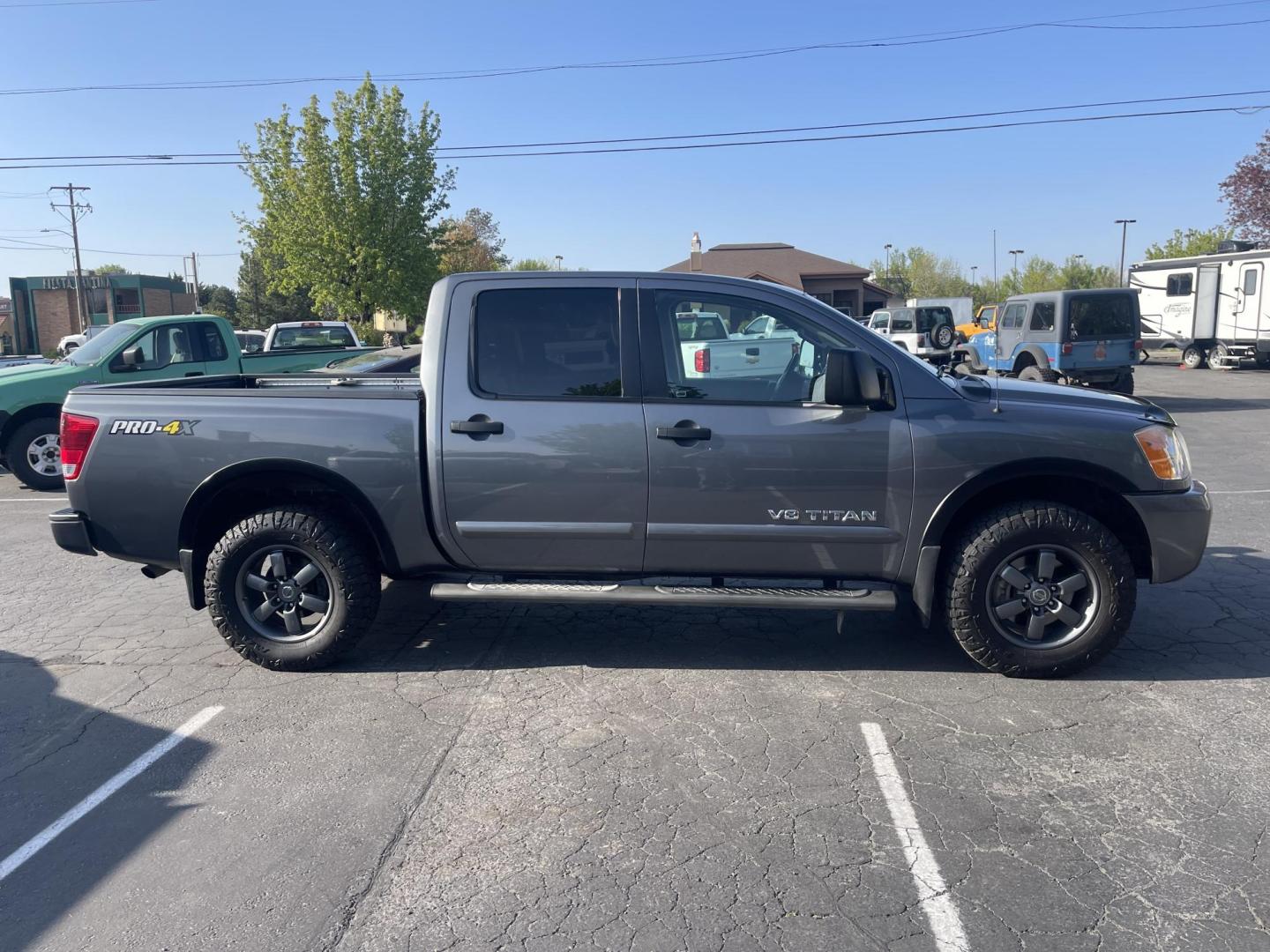 2013 Grey /Black Nissan Titan PRO-4X Crew Cab 4WD SWB (1N6AA0EC9DN) with an 5.6L V8 DOHC 32V engine, 5-Speed Automatic transmission, located at 813 E Fairview Ave, Meridian , ID, 83642, (208) 336-8230, 43.618851, -116.384010 - Photo#3