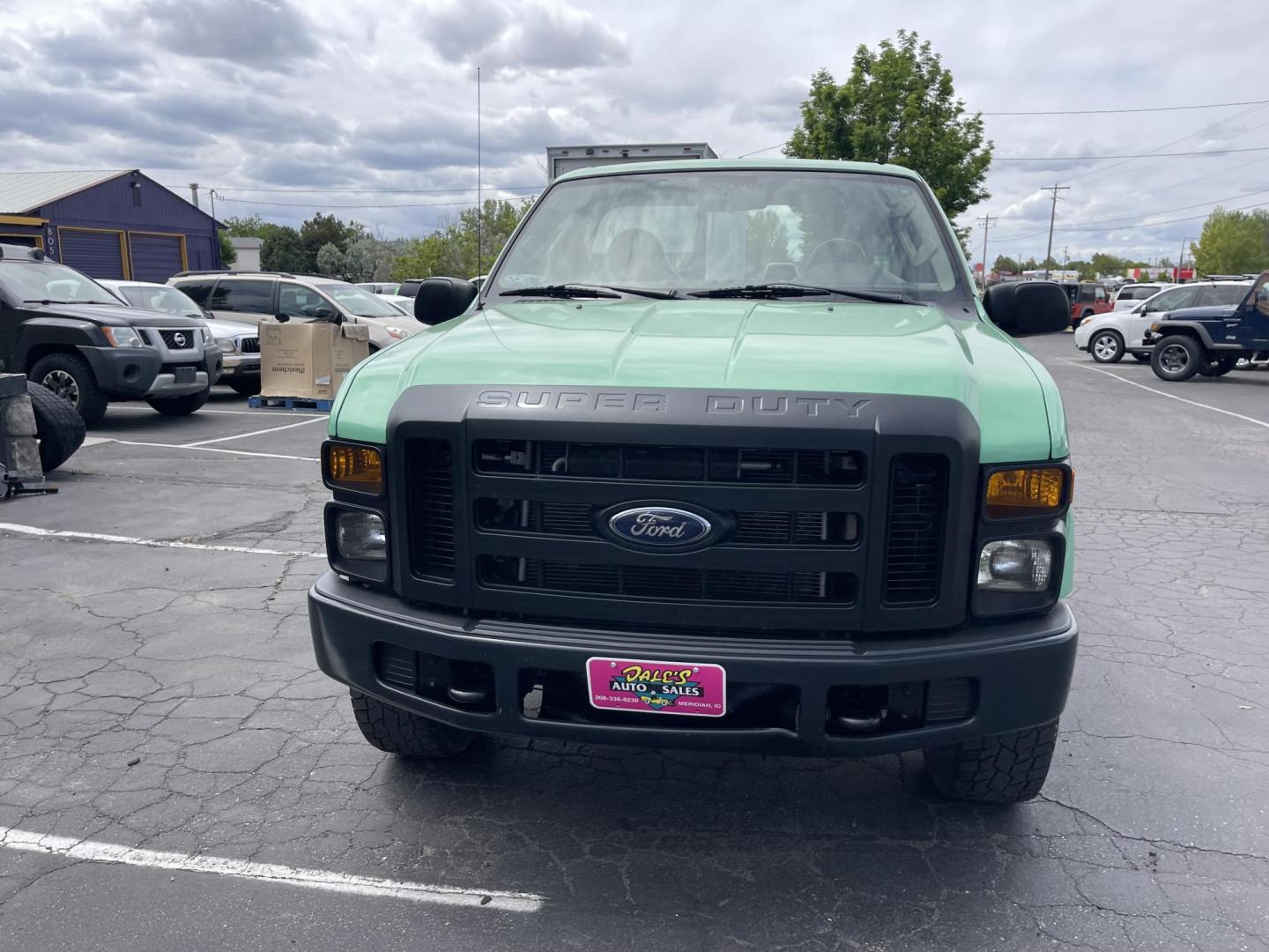 2008 Green /Grey Ford F-350 SD XL 4WD (1FTWF31Y78E) with an 6.8L V10 SOHC 30V engine, AT transmission, located at 813 E Fairview Ave, Meridian , ID, 83642, (208) 336-8230, 43.618851, -116.384010 - Photo#2