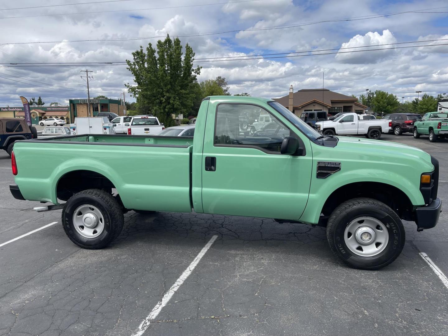 2008 Green /Grey Ford F-350 SD XL 4WD (1FTWF31Y78E) with an 6.8L V10 SOHC 30V engine, AT transmission, located at 813 E Fairview Ave, Meridian , ID, 83642, (208) 336-8230, 43.618851, -116.384010 - Photo#3
