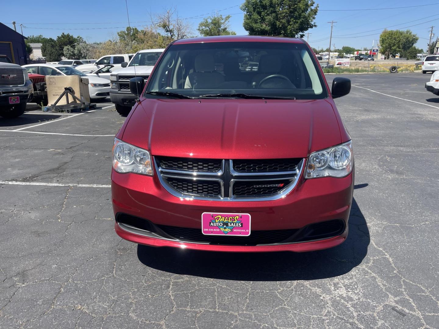 2014 Maroon /Grey with black carpet Dodge Grand Caravan SE (2C4RDGBG7ER) with an 3.6L V6 DOHC 24V engine, 6-Speed Automatic transmission, located at 813 E Fairview Ave, Meridian , ID, 83642, (208) 336-8230, 43.618851, -116.384010 - Photo#2