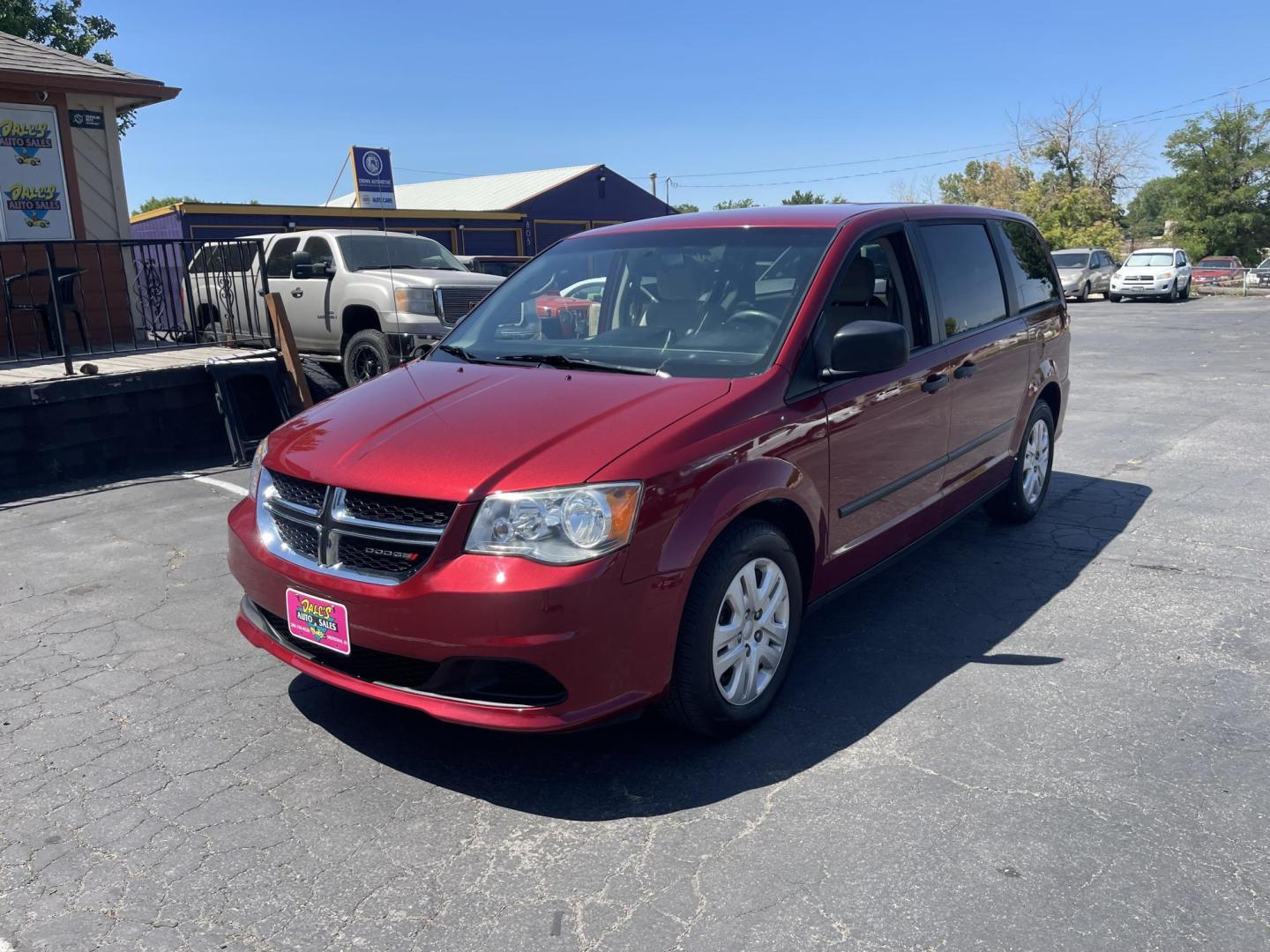 2014 Maroon /Grey with black carpet Dodge Grand Caravan SE (2C4RDGBG7ER) with an 3.6L V6 DOHC 24V engine, 6-Speed Automatic transmission, located at 813 E Fairview Ave, Meridian , ID, 83642, (208) 336-8230, 43.618851, -116.384010 - Photo#1