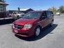2014 Maroon /Grey with black carpet Dodge Grand Caravan SE (2C4RDGBG7ER) with an 3.6L V6 DOHC 24V engine, 6-Speed Automatic transmission, located at 813 E Fairview Ave, Meridian , ID, 83642, (208) 336-8230, 43.618851, -116.384010 - Photo#1