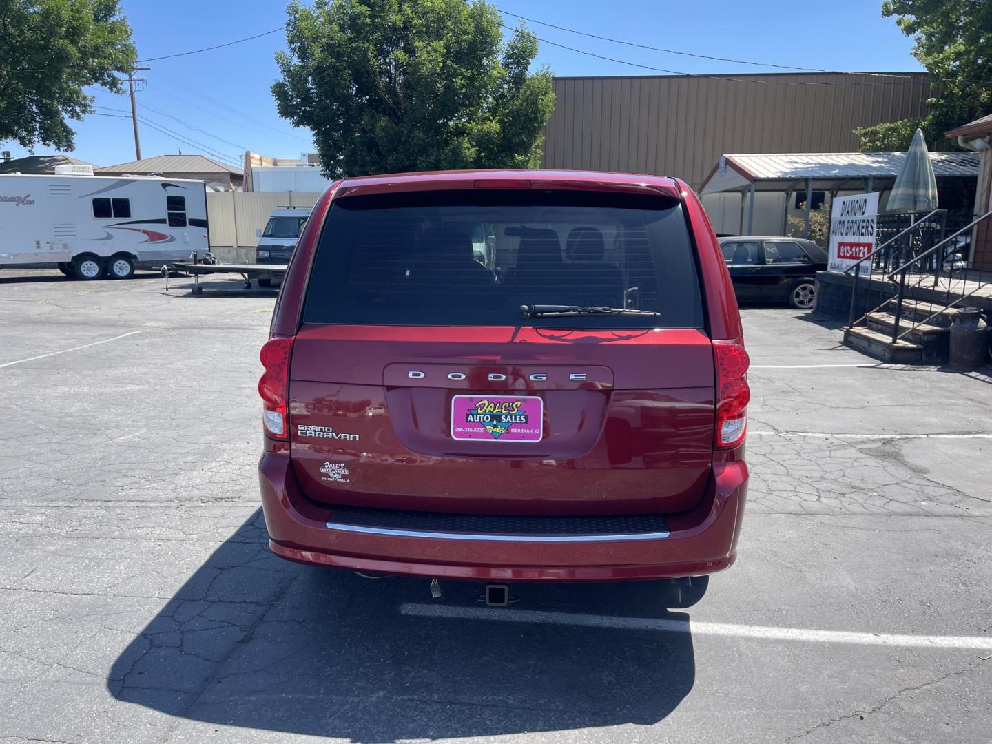2014 Maroon /Grey with black carpet Dodge Grand Caravan SE (2C4RDGBG7ER) with an 3.6L V6 DOHC 24V engine, 6-Speed Automatic transmission, located at 813 E Fairview Ave, Meridian , ID, 83642, (208) 336-8230, 43.618851, -116.384010 - Photo#4