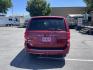 2014 Maroon /Grey with black carpet Dodge Grand Caravan SE (2C4RDGBG7ER) with an 3.6L V6 DOHC 24V engine, 6-Speed Automatic transmission, located at 813 E Fairview Ave, Meridian , ID, 83642, (208) 336-8230, 43.618851, -116.384010 - Photo#4