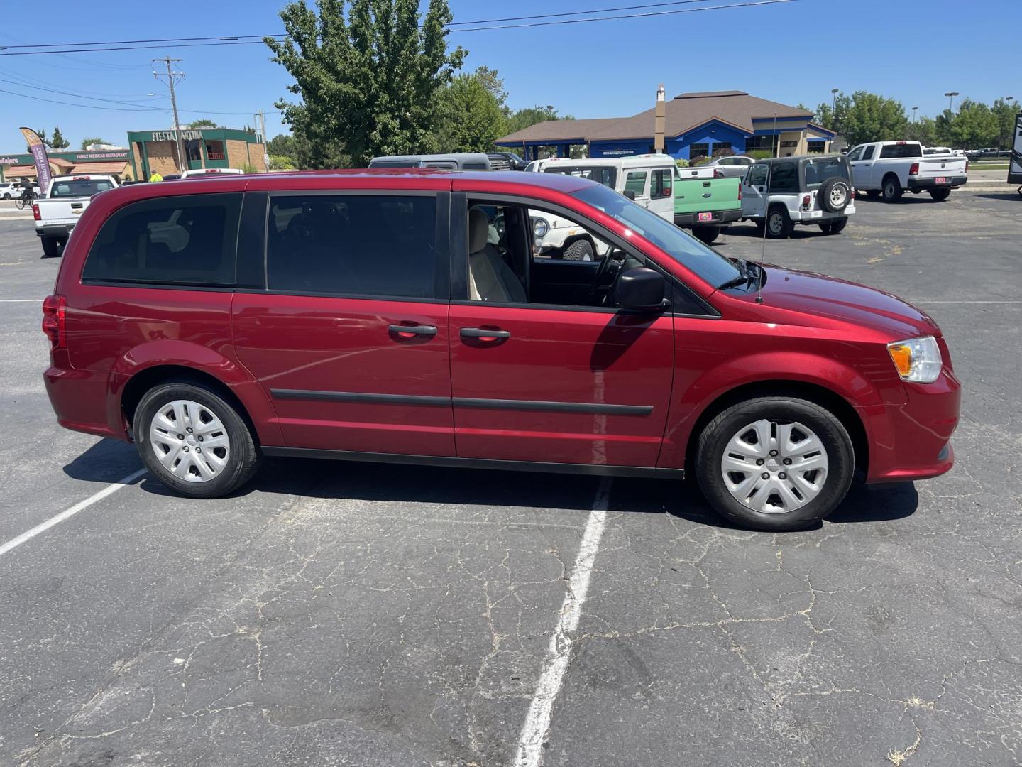 2014 Maroon /Grey with black carpet Dodge Grand Caravan SE (2C4RDGBG7ER) with an 3.6L V6 DOHC 24V engine, 6-Speed Automatic transmission, located at 813 E Fairview Ave, Meridian , ID, 83642, (208) 336-8230, 43.618851, -116.384010 - Photo#3