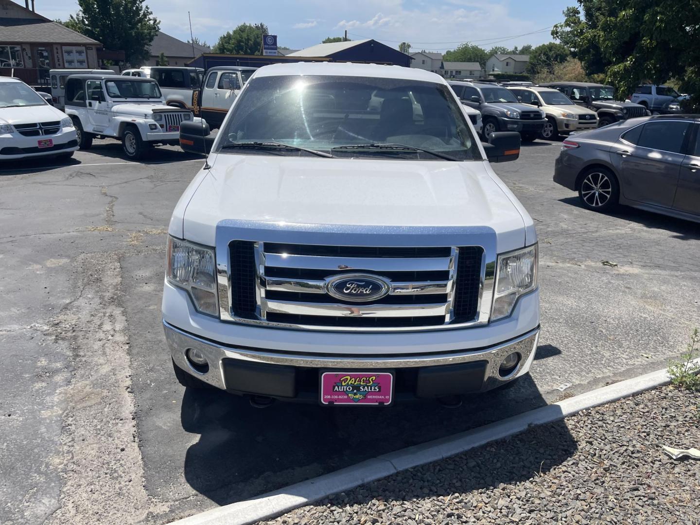 2012 White /Grey Ford F-150 XLT (1FTMF1EF8CF) with an 5.0L V8 OHV 16V engine, 6-Speed Automatic transmission, located at 813 E Fairview Ave, Meridian , ID, 83642, (208) 336-8230, 43.618851, -116.384010 - Photo#2