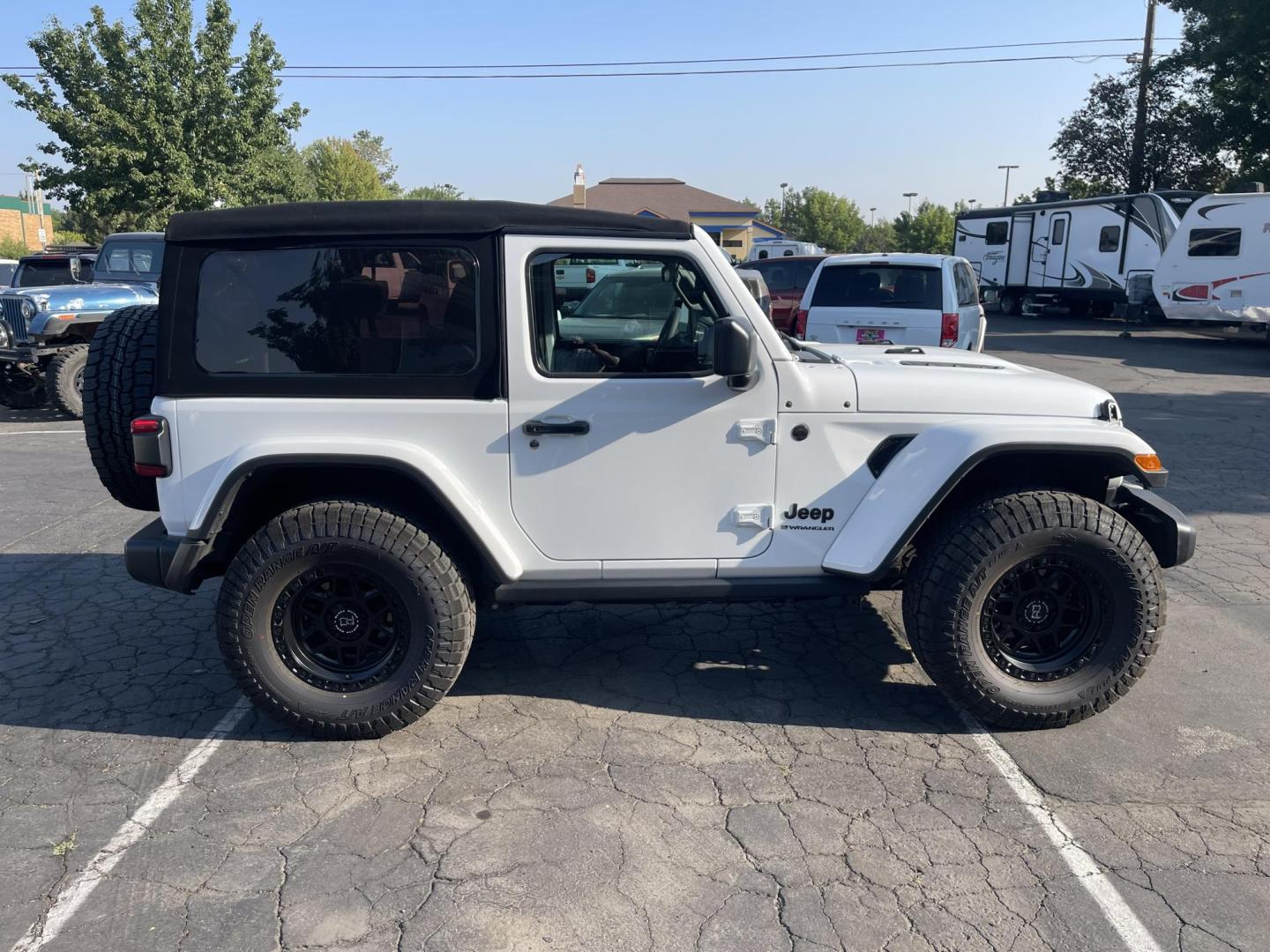 2024 White /Black Jeep Wrangler Willy's (1C4PJXAG0RW) with an 3.6L V6 DOHC 24V engine, 6M transmission, located at 813 E Fairview Ave, Meridian , ID, 83642, (208) 336-8230, 43.618851, -116.384010 - A very nice almost new Wrangler with lots of custom additions. Set of 5 matching Black Rhino wheels and Open Range AT tires that look spectacular. Rubicon Hood and Paint to match fender flares. K&N Cold Air Intake, and $3,000 Magnaflow Dual cat back exhaust. If you want a super cool Wrangler thi - Photo#3
