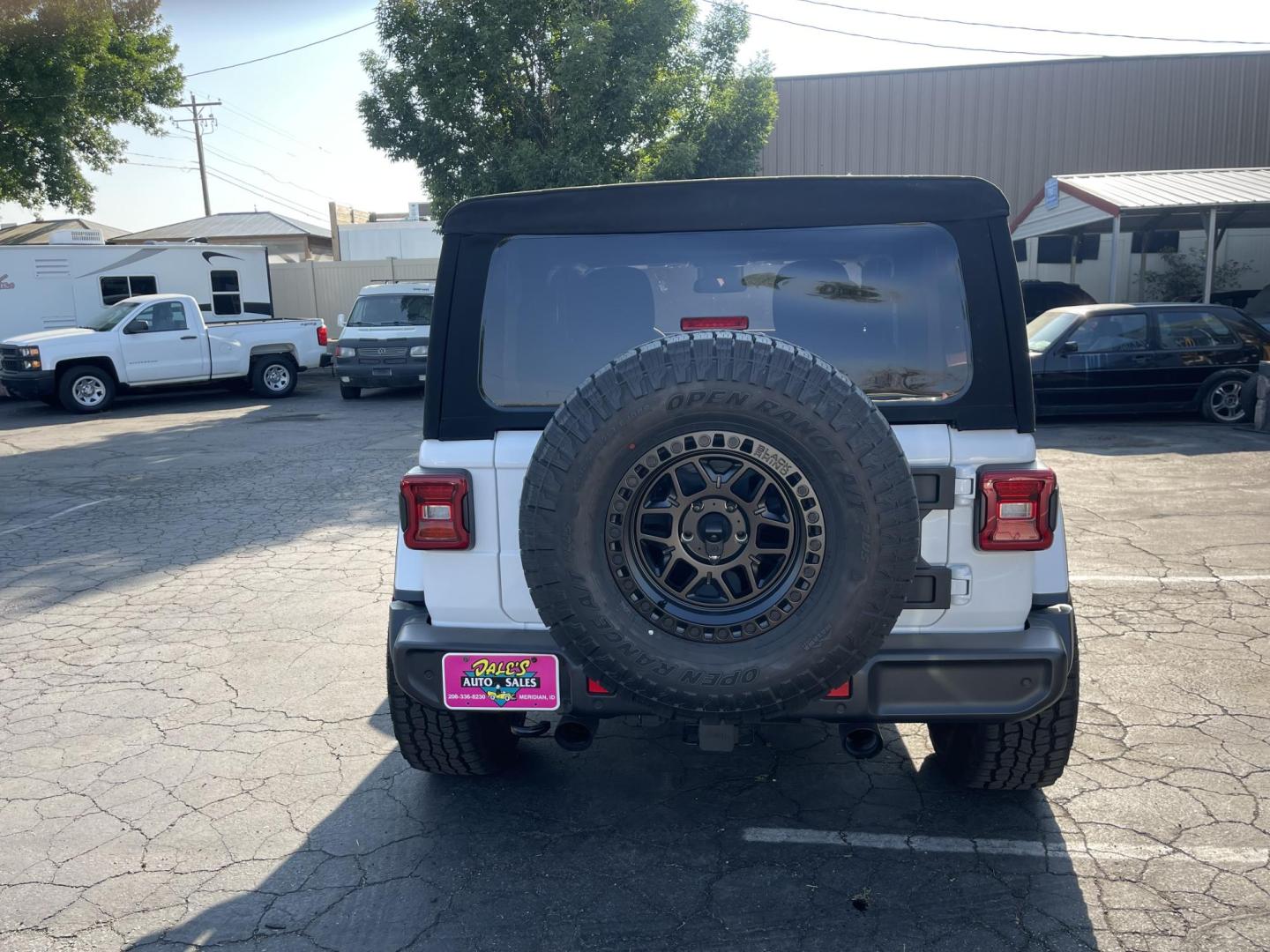 2024 White /Black Jeep Wrangler Willy's (1C4PJXAG0RW) with an 3.6L V6 DOHC 24V engine, 6M transmission, located at 813 E Fairview Ave, Meridian , ID, 83642, (208) 336-8230, 43.618851, -116.384010 - A very nice almost new Wrangler with lots of custom additions. Set of 5 matching Black Rhino wheels and Open Range AT tires that look spectacular. Rubicon Hood and Paint to match fender flares. K&N Cold Air Intake, and $3,000 Magnaflow Dual cat back exhaust. If you want a super cool Wrangler thi - Photo#4