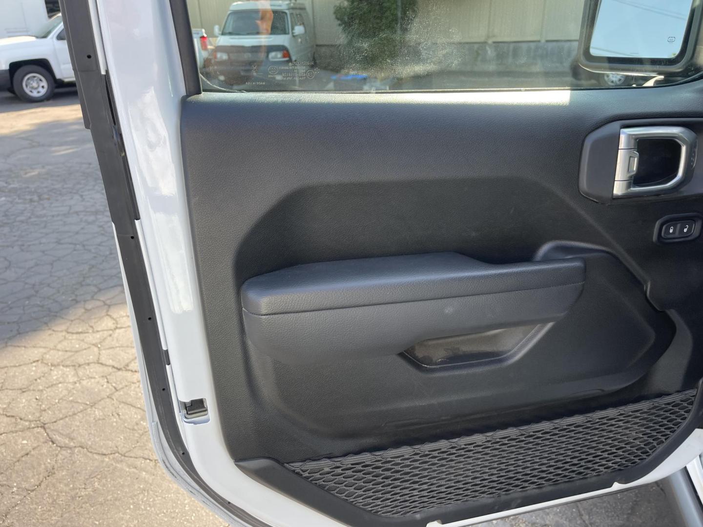 2024 White /Black Jeep Wrangler Willy's (1C4PJXAG0RW) with an 3.6L V6 DOHC 24V engine, 6M transmission, located at 813 E Fairview Ave, Meridian , ID, 83642, (208) 336-8230, 43.618851, -116.384010 - A very nice almost new Wrangler with lots of custom additions. Set of 5 matching Black Rhino wheels and Open Range AT tires that look spectacular. Rubicon Hood and Paint to match fender flares. K&N Cold Air Intake, and $3,000 Magnaflow Dual cat back exhaust. If you want a super cool Wrangler thi - Photo#6