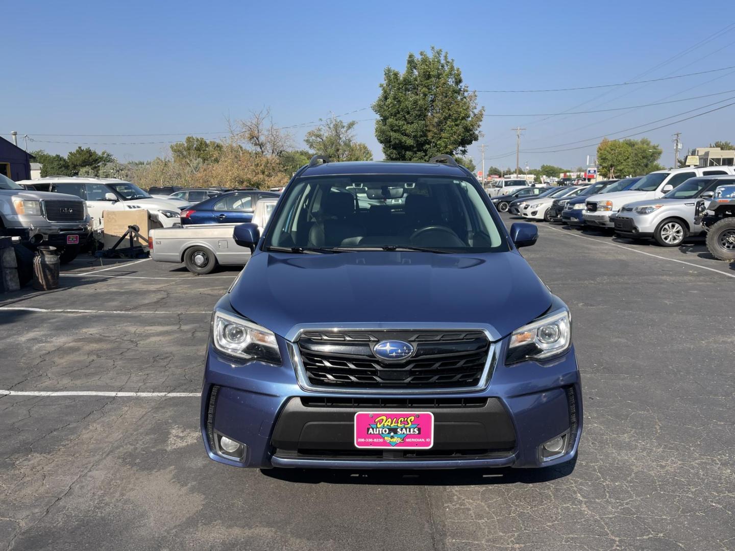 2017 Blue /Black Subaru Forester 2.0XT Touring (JF2SJGWC0HH) with an 2.0L H4 SOHC 16V engine, CVT transmission, located at 813 E Fairview Ave, Meridian , ID, 83642, (208) 336-8230, 43.618851, -116.384010 - If you want a nice Subaru this is a great option. This Forester is Loaded Loaded Loaded. It has adaptive cruise control, the big Sunroof, Leather, Navigation, Harmon Kardon stereo, heated seats, power seats, backup camera lane departure, this is as nice of a Forester as you can get come take a loo - Photo#2