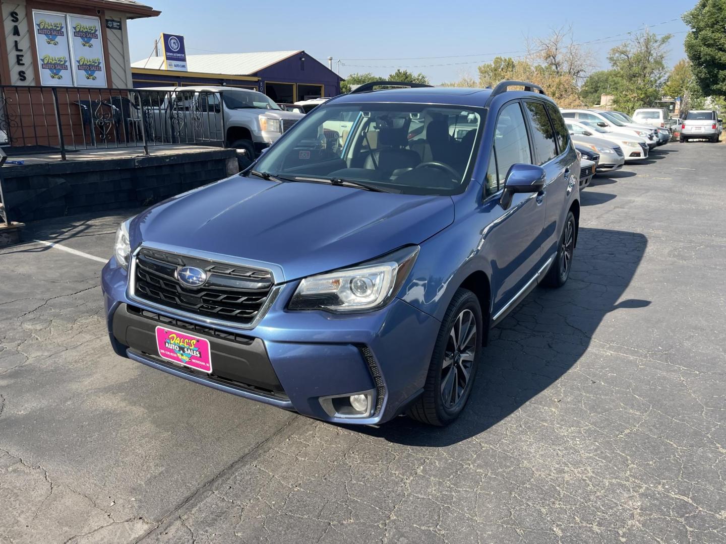 2017 Blue /Black Subaru Forester 2.0XT Touring (JF2SJGWC0HH) with an 2.0L H4 SOHC 16V engine, CVT transmission, located at 813 E Fairview Ave, Meridian , ID, 83642, (208) 336-8230, 43.618851, -116.384010 - If you want a nice Subaru this is a great option. This Forester is Loaded Loaded Loaded. It has adaptive cruise control, the big Sunroof, Leather, Navigation, Harmon Kardon stereo, heated seats, power seats, backup camera lane departure, this is as nice of a Forester as you can get come take a loo - Photo#1