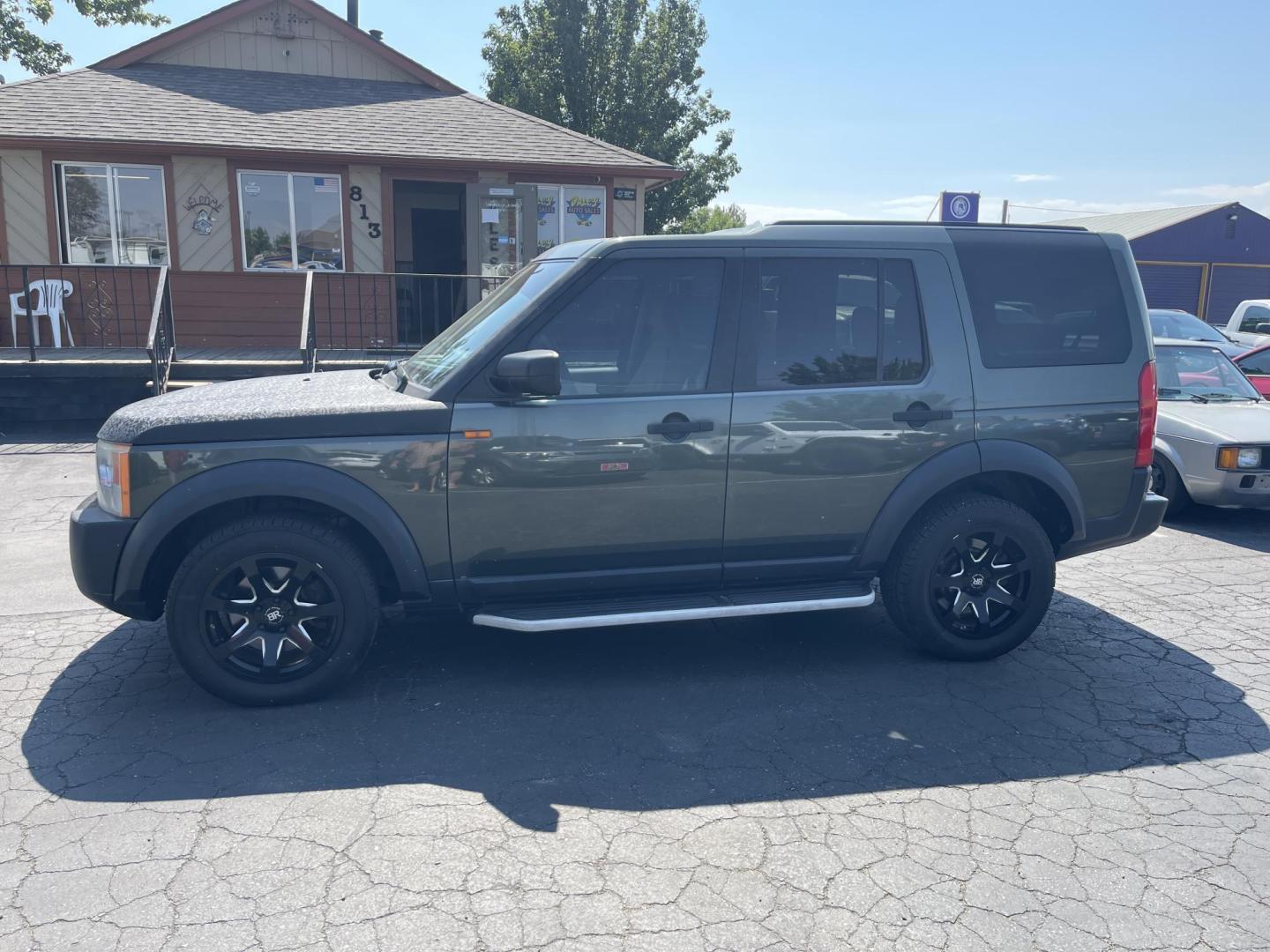 2006 Green /Tan Land Rover LR3 SE (SALAE25406A) with an 4.4L V8 DOHC 32V engine, 6-Speed Automatic Overdrive transmission, located at 813 E Fairview Ave, Meridian , ID, 83642, (208) 336-8230, 43.618851, -116.384010 - Photo#0
