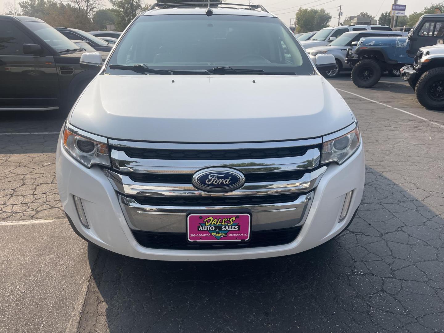 2013 White /Tan Ford Edge SEL AWD (2FMDK4JC2DB) with an 3.5L V6 DOHC 24V engine, 6-Speed Automatic transmission, located at 813 E Fairview Ave, Meridian , ID, 83642, (208) 336-8230, 43.618851, -116.384010 - A one owner extremely clean Ford Edge. It has a few miles thats why its so cheap. You will not belive how clean and well cared for this vehicle is. This vehicle has been extremely well cared for and serviced reguarly. It has almost new tires. It has leather with ice cold A/C. This SUV drives extre - Photo#2