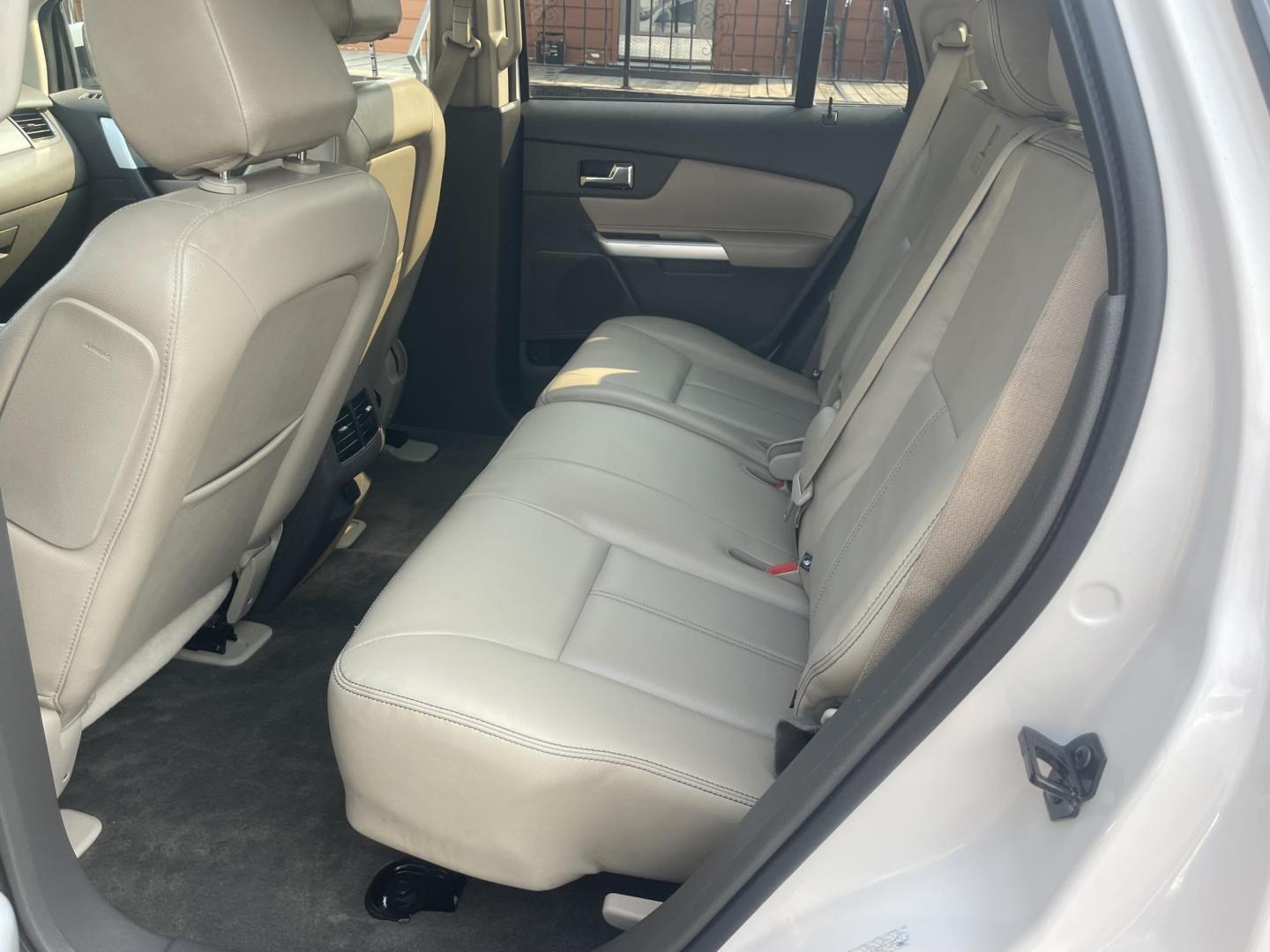 2013 White /Tan Ford Edge SEL AWD (2FMDK4JC2DB) with an 3.5L V6 DOHC 24V engine, 6-Speed Automatic transmission, located at 813 E Fairview Ave, Meridian , ID, 83642, (208) 336-8230, 43.618851, -116.384010 - A one owner extremely clean Ford Edge. It has a few miles thats why its so cheap. You will not belive how clean and well cared for this vehicle is. This vehicle has been extremely well cared for and serviced reguarly. It has almost new tires. It has leather with ice cold A/C. This SUV drives extre - Photo#5