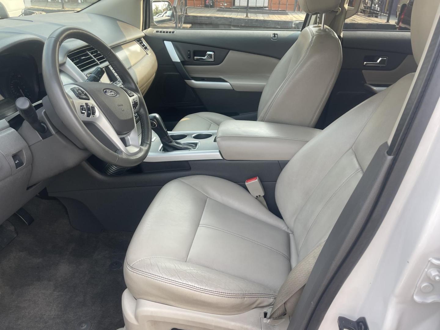 2013 White /Tan Ford Edge SEL AWD (2FMDK4JC2DB) with an 3.5L V6 DOHC 24V engine, 6-Speed Automatic transmission, located at 813 E Fairview Ave, Meridian , ID, 83642, (208) 336-8230, 43.618851, -116.384010 - A one owner extremely clean Ford Edge. It has a few miles thats why its so cheap. You will not belive how clean and well cared for this vehicle is. This vehicle has been extremely well cared for and serviced reguarly. It has almost new tires. It has leather with ice cold A/C. This SUV drives extre - Photo#6
