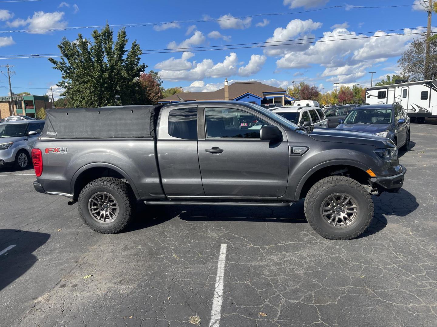 2019 Grey /Black Ford Ranger XLT, FX4 (1FTER1FH7KL) with an 2.3L L4 DOHC 16V engine, 10A transmission, located at 813 E Fairview Ave, Meridian , ID, 83642, (208) 336-8230, 43.618851, -116.384010 - A very nice high optioned Ford Ranger. Runs and drives very well. This Ranger has the FX4 package, flat tow option, added LED lights, aftermarket suspension, aftermarket wheels, excellent tires and a soft top canopy. Come take a look and get yourself a very nice Ranger for not a big price. - Photo#2