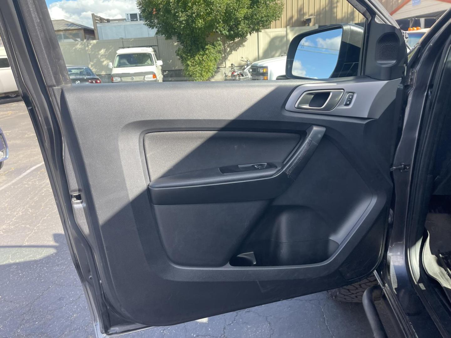 2019 Grey /Black Ford Ranger XLT, FX4 (1FTER1FH7KL) with an 2.3L L4 DOHC 16V engine, 10A transmission, located at 813 E Fairview Ave, Meridian , ID, 83642, (208) 336-8230, 43.618851, -116.384010 - A very nice high optioned Ford Ranger. Runs and drives very well. This Ranger has the FX4 package, flat tow option, added LED lights, aftermarket suspension, aftermarket wheels, excellent tires and a soft top canopy. Come take a look and get yourself a very nice Ranger for not a big price. - Photo#7