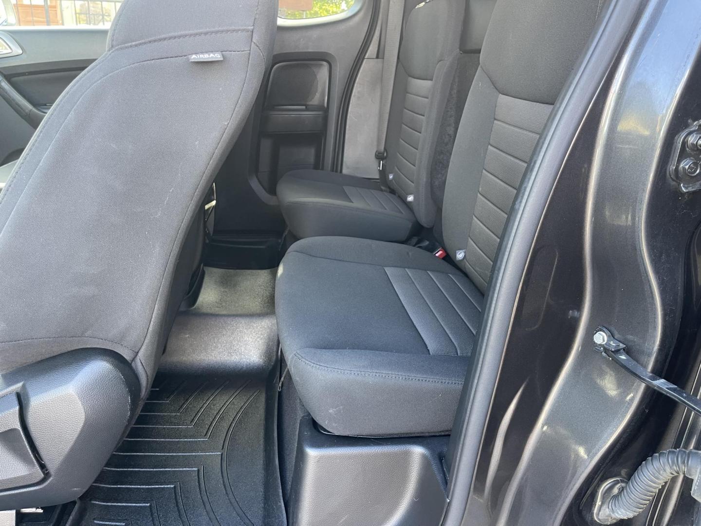 2019 Grey /Black Ford Ranger XLT, FX4 (1FTER1FH7KL) with an 2.3L L4 DOHC 16V engine, 10A transmission, located at 813 E Fairview Ave, Meridian , ID, 83642, (208) 336-8230, 43.618851, -116.384010 - A very nice high optioned Ford Ranger. Runs and drives very well. This Ranger has the FX4 package, flat tow option, added LED lights, aftermarket suspension, aftermarket wheels, excellent tires and a soft top canopy. Come take a look and get yourself a very nice Ranger for not a big price. - Photo#8