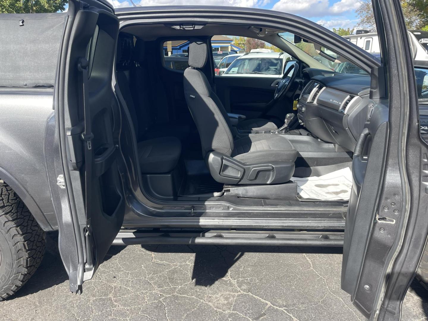 2019 Grey /Black Ford Ranger XLT, FX4 (1FTER1FH7KL) with an 2.3L L4 DOHC 16V engine, 10A transmission, located at 813 E Fairview Ave, Meridian , ID, 83642, (208) 336-8230, 43.618851, -116.384010 - A very nice high optioned Ford Ranger. Runs and drives very well. This Ranger has the FX4 package, flat tow option, added LED lights, aftermarket suspension, aftermarket wheels, excellent tires and a soft top canopy. Come take a look and get yourself a very nice Ranger for not a big price. - Photo#18