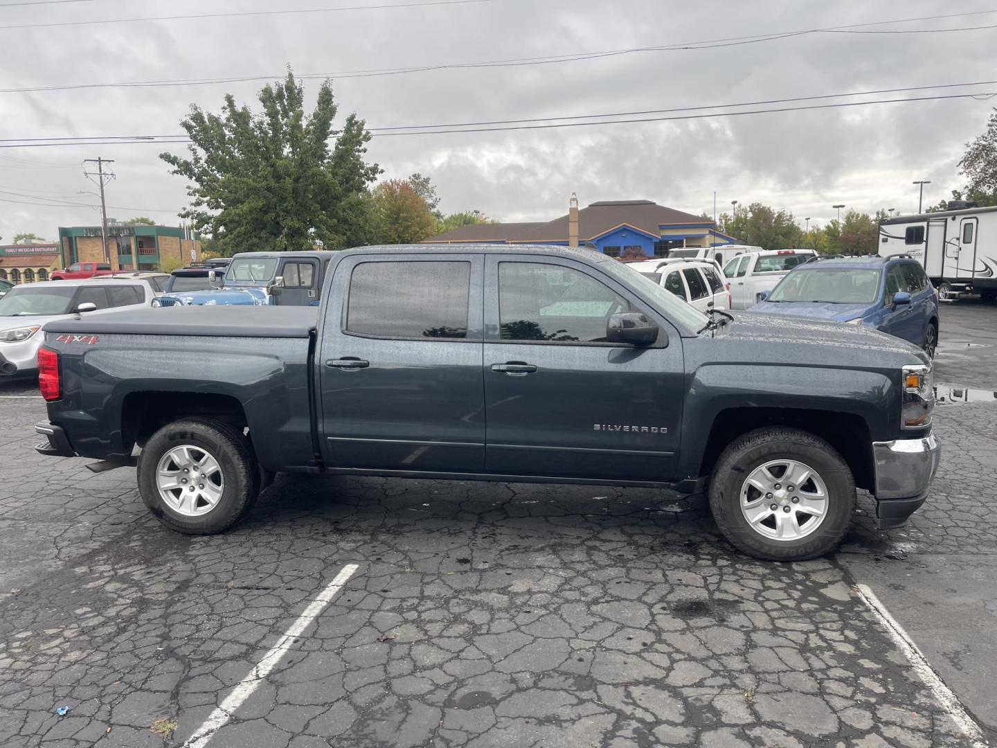 2018 Grey /Black Chevrolet Silverado 1500 LT Crew Cab Long Box 4WD (3GCUKREC4JG) with an 5.3L V8 OHV 16V engine, AT transmission, located at 813 E Fairview Ave, Meridian , ID, 83642, (208) 336-8230, 43.618851, -116.384010 - 2019 Chevrolet Silverado 1500 Crew Cab 4x4. Come take a test drive. Super cheap Silverado Crew Cab. Runs and drives very well. - Photo#3