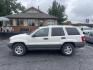 1999 White /Grey Jeep Grand Cherokee Laredo 4WD (1J4GW58N7XC) with an 4.7L V8 SOHC 16V engine, 4-Speed Automatic Overdrive transmission, located at 813 E Fairview Ave, Meridian , ID, 83642, (208) 336-8230, 43.618851, -116.384010 - Brand new engine 1100 miles ago, has a 3 year 36,000 mile transferable warranty. - Photo#0