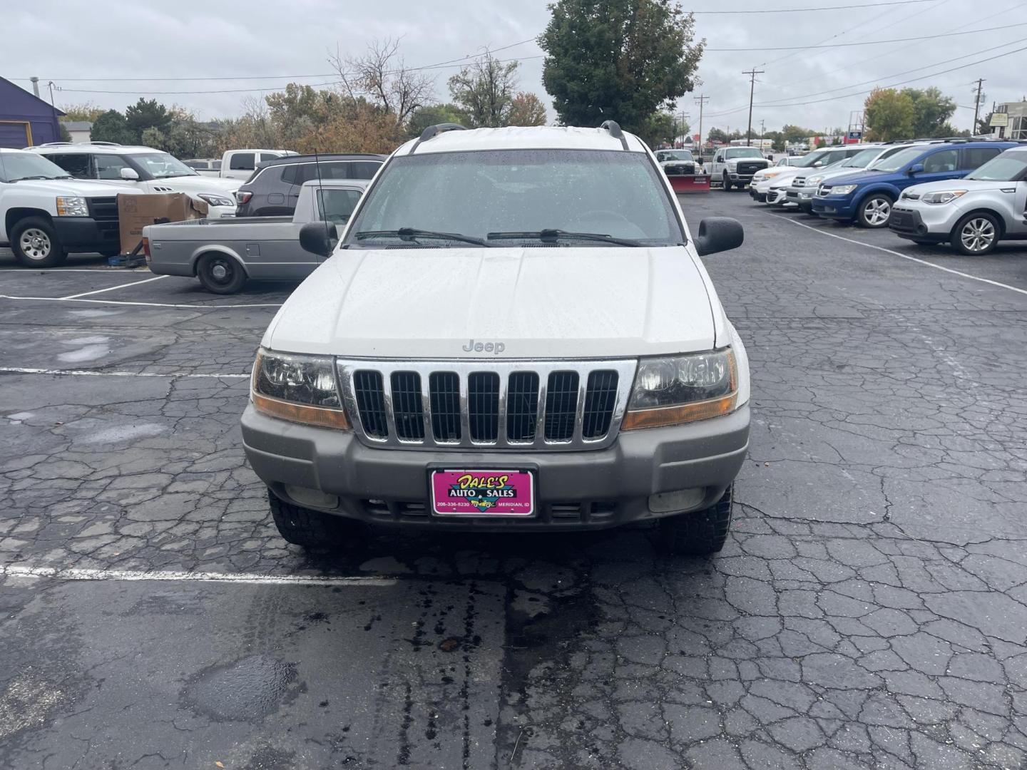 1999 White /Grey Jeep Grand Cherokee Laredo 4WD (1J4GW58N7XC) with an 4.7L V8 SOHC 16V engine, 4-Speed Automatic Overdrive transmission, located at 813 E Fairview Ave, Meridian , ID, 83642, (208) 336-8230, 43.618851, -116.384010 - Brand new engine 1100 miles ago, has a 3 year 36,000 mile transferable warranty. - Photo#2