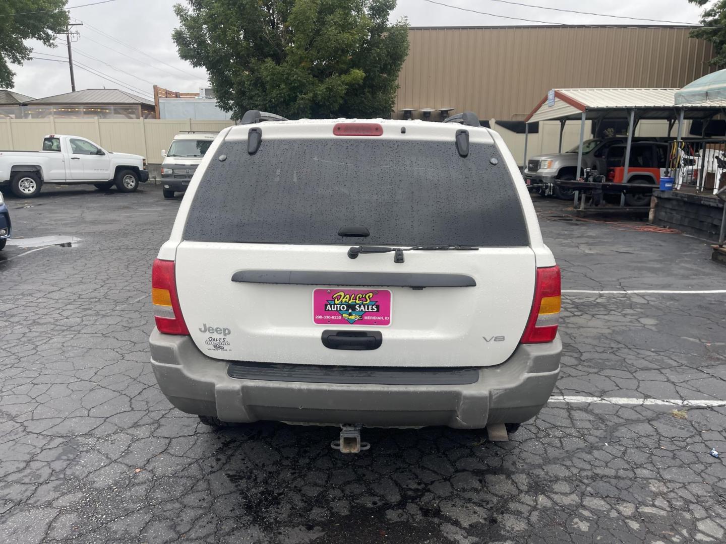 1999 White /Grey Jeep Grand Cherokee Laredo 4WD (1J4GW58N7XC) with an 4.7L V8 SOHC 16V engine, 4-Speed Automatic Overdrive transmission, located at 813 E Fairview Ave, Meridian , ID, 83642, (208) 336-8230, 43.618851, -116.384010 - Brand new engine 1100 miles ago, has a 3 year 36,000 mile transferable warranty. - Photo#4