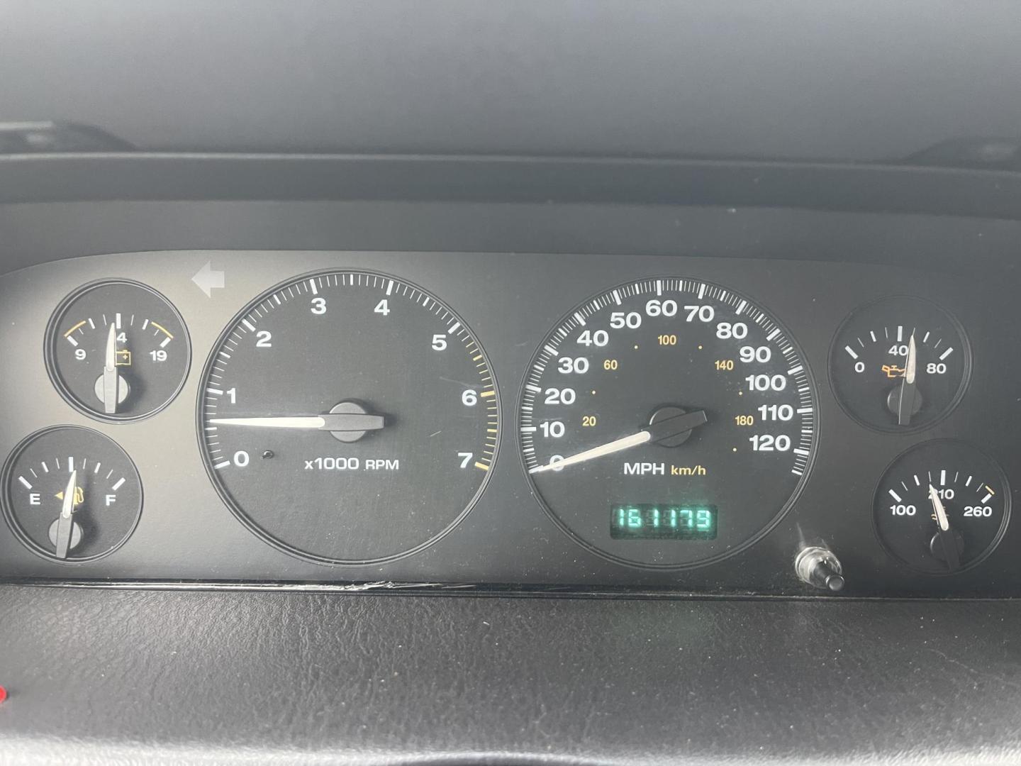 1999 White /Grey Jeep Grand Cherokee Laredo 4WD (1J4GW58N7XC) with an 4.7L V8 SOHC 16V engine, 4-Speed Automatic Overdrive transmission, located at 813 E Fairview Ave, Meridian , ID, 83642, (208) 336-8230, 43.618851, -116.384010 - Brand new engine 1100 miles ago, has a 3 year 36,000 mile transferable warranty. - Photo#8