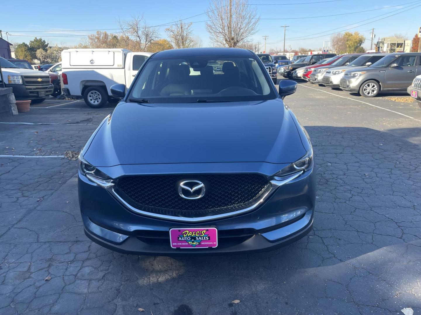 2017 Blue /Black Mazda CX-5 Sport AWD (JM3KFBBL3H0) with an 2.5L L4 DOHC 16V engine, 6A transmission, located at 813 E Fairview Ave, Meridian , ID, 83642, (208) 336-8230, 43.618851, -116.384010 - What a great little crossover vehicle. Great gas mileage, fun to drive, only has 68k miles. Very clean and ready to go. Come see for your self. - Photo#2