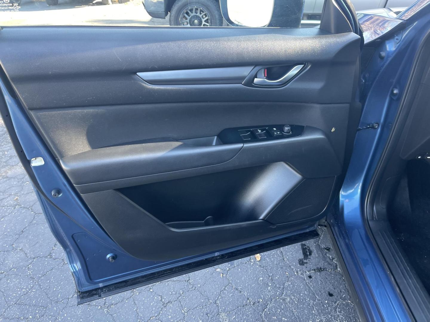 2017 Blue /Black Mazda CX-5 Sport AWD (JM3KFBBL3H0) with an 2.5L L4 DOHC 16V engine, 6A transmission, located at 813 E Fairview Ave, Meridian , ID, 83642, (208) 336-8230, 43.618851, -116.384010 - What a great little crossover vehicle. Great gas mileage, fun to drive, only has 68k miles. Very clean and ready to go. Come see for your self. - Photo#5