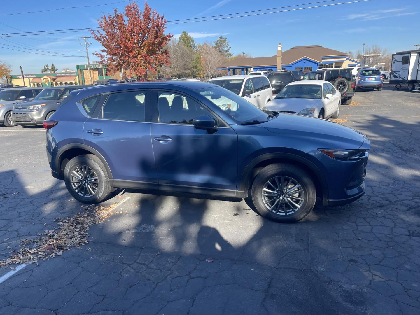 2017 Blue /Black Mazda CX-5 Sport AWD (JM3KFBBL3H0) with an 2.5L L4 DOHC 16V engine, 6A transmission, located at 813 E Fairview Ave, Meridian , ID, 83642, (208) 336-8230, 43.618851, -116.384010 - What a great little crossover vehicle. Great gas mileage, fun to drive, only has 68k miles. Very clean and ready to go. Come see for your self. - Photo#3