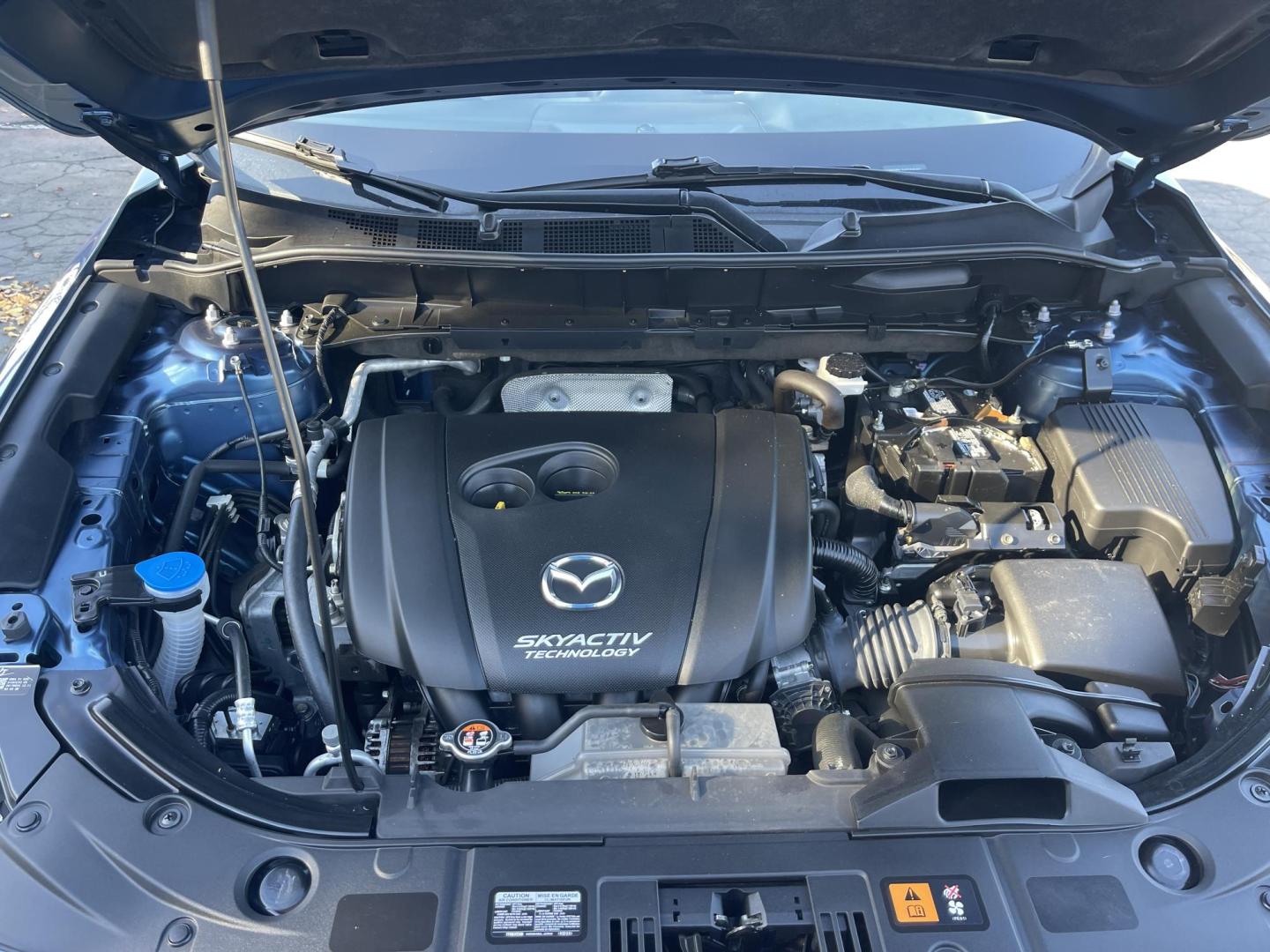 2017 Blue /Black Mazda CX-5 Sport AWD (JM3KFBBL3H0) with an 2.5L L4 DOHC 16V engine, 6A transmission, located at 813 E Fairview Ave, Meridian , ID, 83642, (208) 336-8230, 43.618851, -116.384010 - What a great little crossover vehicle. Great gas mileage, fun to drive, only has 68k miles. Very clean and ready to go. Come see for your self. - Photo#12