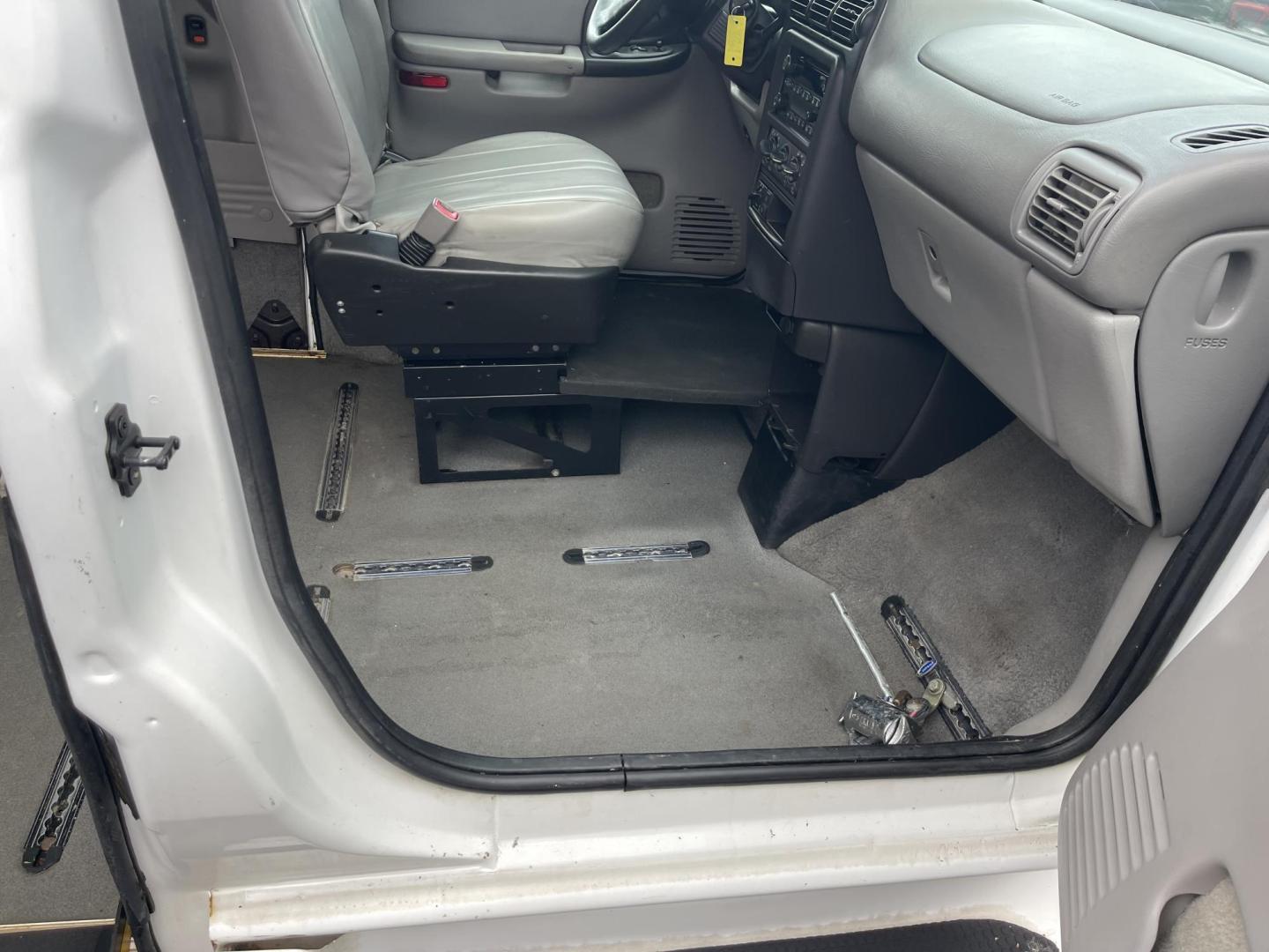 2002 White /Grey Chevrolet Venture Extended Wheelbase LS Wheel Chair Van (1GNDX03E82D) with an 3.4L V6 OHV 12V engine, 4-Speed Automatic Overdrive transmission, located at 813 E Fairview Ave, Meridian , ID, 83642, (208) 336-8230, 43.618851, -116.384010 - This van is a handicap wheelchair van. It has an Eldorado conversion. The van runs and drives good is clean and ready to go. If you are in need of an inexpensive wheelchair van this is a great option. - Photo#3
